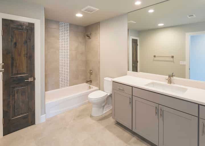 A professional bathtub and shower installation adds functionality to a Emeryville, CA bathroom.